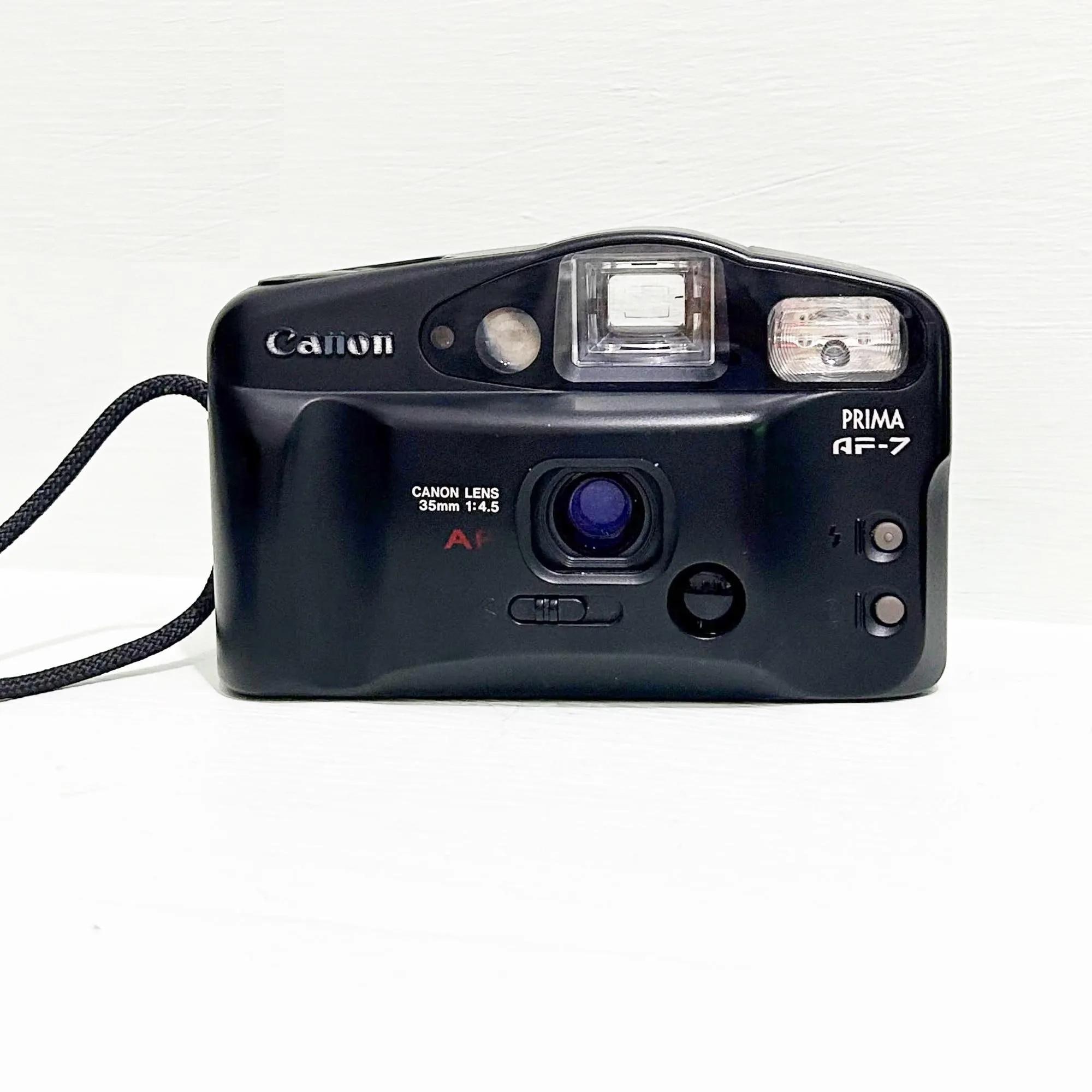 Canon フィルムカメラ 126257 レザーケース付き　昭和レトロ　ジャンク il_fullxfull.6870984912_sq24.jpg