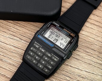 RARE Vintage Casio DBC-80 Databank World Time Calculator Watch