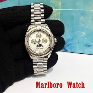 Collectibles Marlboro wrist watch/ Great vintage condition/  Steel Cord/ Very nice collectible item/Works very well