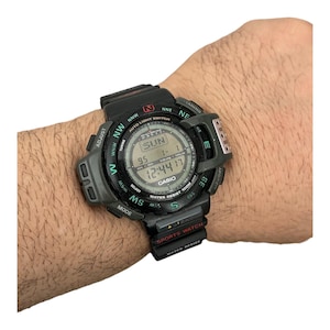 May include: A set of three ceramic mugs with a speckled, matte finish. Each mug features a different color: light blue, cream, and gray. The mugs have a simple, modern design and a comfortable handle. Perfect for coffee or tea.