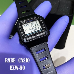 Casio EXW-50  Digital Watch/Calorie Jog Walk Very Good Condition / Casio Tin BOX/ MOD:611 Japan T/ Rare Discontinued Vintage Men&#39;s/ Black