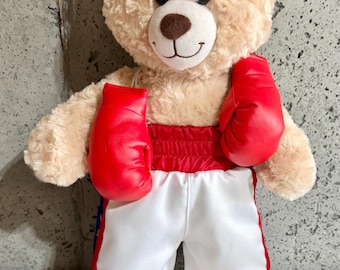 Build-A-Bearのパーソナライズされたボクシングショーツとグローブ。ベアは付属しません。