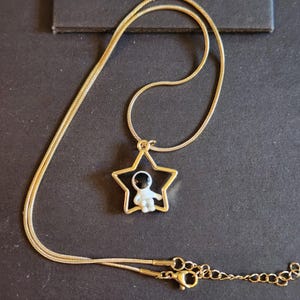 Moon & Star Astronauts Pendants