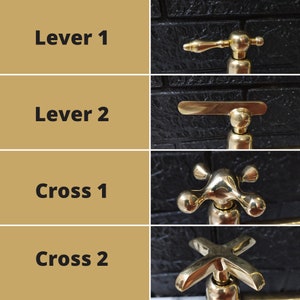 May include: Four different styles of gold-toned faucet handles. The handles are labeled "Lever 1", "Lever 2", "Cross 1", and "Cross 2".
