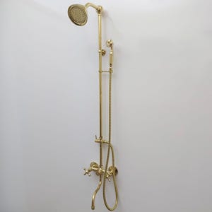 Unlacquered Brass Shower System with Round Shower Head, Handheld Shower Head, and Tub Filler with Cross Handles