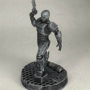 Miniatura pintada / Miniaturas Papsikels / Cyberpunk / Ficção científica / Personagem do jogador / Corpo Cop / NPC / Robo