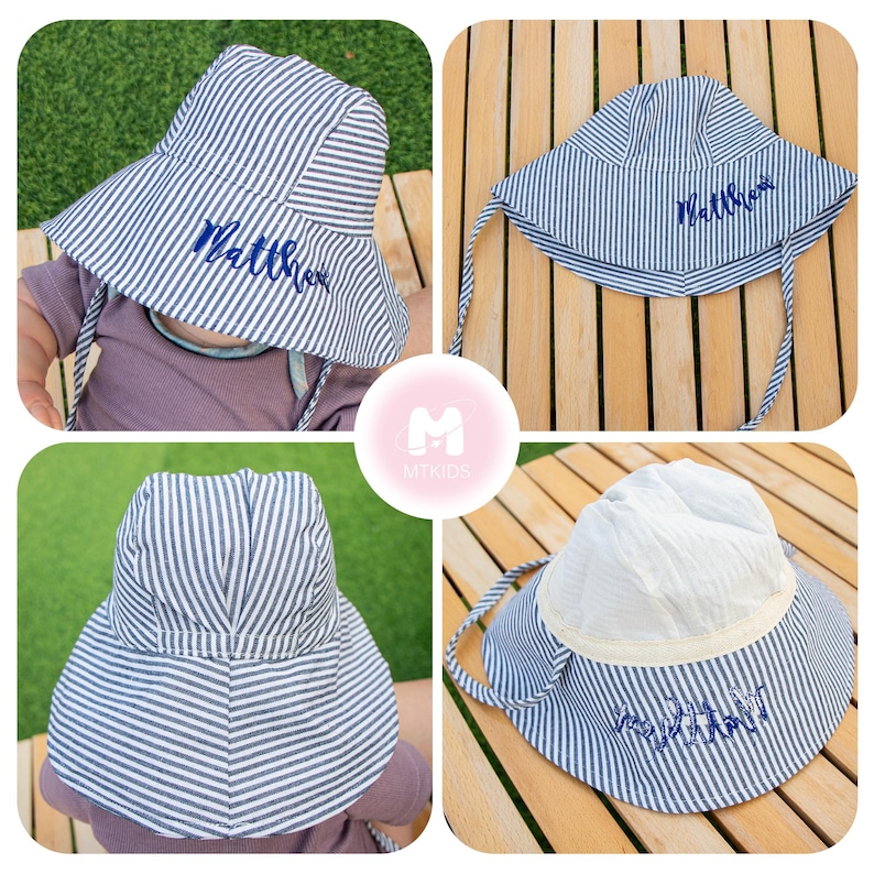 May include: A blue and white striped sun hat with a blue embroidered name "Matthew". The hat has a wide brim and a chin strap.