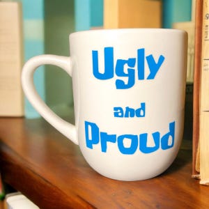 Ugly and Proud Mug | Novelty Mugs, TV Show Gifts, Cartoon Gifts, Cartoon Mugs, Pop Culture Gifts, Funny Mug, Funny Meme Mugs, Millennial Mug