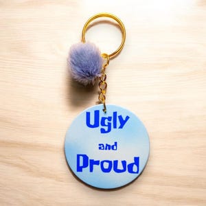Ugly and Proud Keychain | Funny Keychains, Cartoon, Cartoon Keychains, Cartoon Gifts, Meme Keychains, Funny Gifts, Cute Keychains