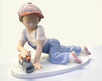 Lladro “All Aboard” #7619 – Hand-Painted Porcelain Figurine – Rare & Retired