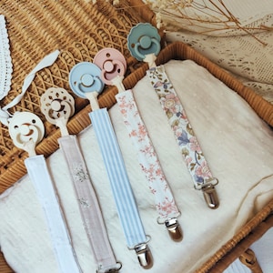 Soft season fabric pacifier clip