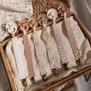 Beige pacifier clip