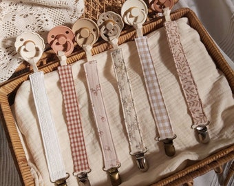 Beige pacifier clip