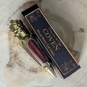 COVEN Mixed berry flavored lip gloss, scented, dark pigment, gothic cosmetics, gold, luxury lip color, vegan makeup, mauve tinted, witchy image 1