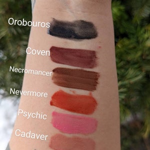 COVEN Mixed berry flavored lip gloss, scented, dark pigment, gothic cosmetics, gold, luxury lip color, vegan makeup, mauve tinted, witchy image 4