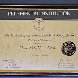 May include: A framed certificate from the Reid Mental Institution, awarding "CUSTOM NAME" with the title "Donkey Brains". The certificate is signed by Noah Mathers, President, and Christina Haberkern, Attending Psychiatrist.