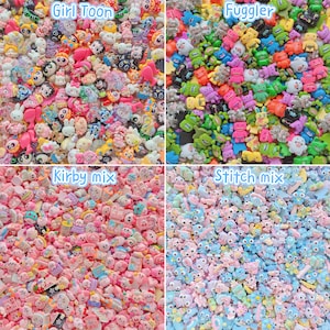 May include: A collection of four distinct sets of small, colorful resin cabochons. The top left features Girl Toon characters, the top right displays Fuggler creatures, the bottom left shows a Kirby mix, and the bottom right contains a Stitch mix.