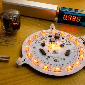 Juno Dekatron v1.1 DIY Soldering kit - 17 Neon Lamp Chaser w/ NE555 Timers and CD4017 Counter & High Voltage Boost - Nixie Tube Alternative