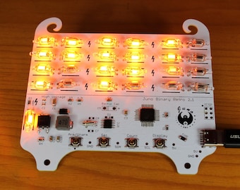 New Juno Binary Clock Retro 2.1: A 24 High Voltage Neon Lamp RTC w/ AVR Microcontroller driven 5v to 170v - Maker's DIY Electronics Kit