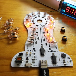 Juno Love Tower v1.0 DIY Soldering Project - 17 Neon Lamp High Voltage Infinity Hourglass Timer w/ NE555 & CD4017 ICs - Advanced Electronics
