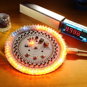 Juno Star Chaser Retro DIY Electronics Kit - 60 Neon Lamp Clock w/ AVR Microcontroller & High Voltage Boost Circuit - Nixie Tube Alternative