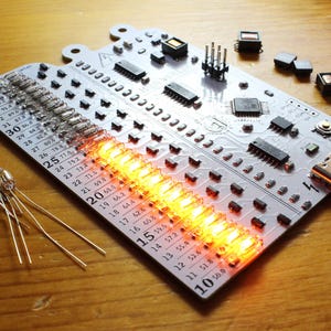 Juno Neon Thermometer DIY Soldering Project Kit - 27 Neon Lamps w/ AVR Microcontroller & High Voltage Flyback Circuit - Advanced Electronics