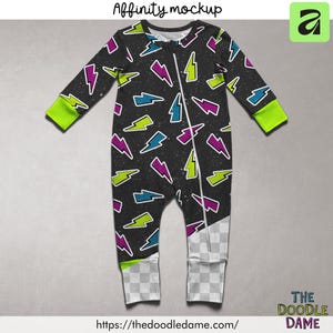 May include: A black baby sleeper with a pattern of colorful lightning bolts in purple, blue, and green. The sleeper has a zipper down the front and neon green cuffs. The text "Affinity mockup" is at the top.