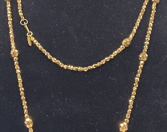 Miriam Haskell faceted gold bead necklace.
