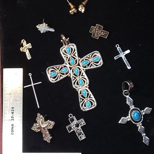 Assorted costume jewelry crosses