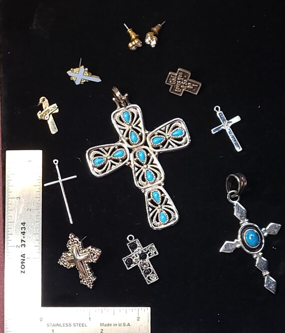 Assorted costume jewelry crosses