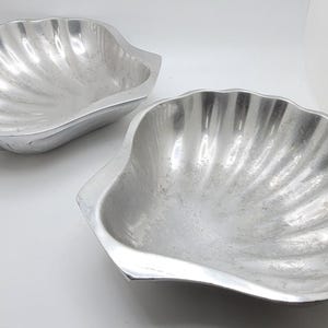 Vintage pair of cast aluminum scallop shell service bowls hand finished