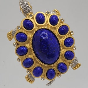Kenneth Jay Lane tortoise with art glass lapis lazuli cabochons and Swarovski crystal rhinestones.