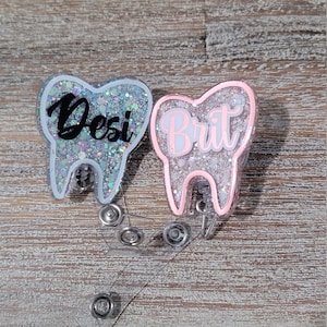 Personalized tooth badge reel