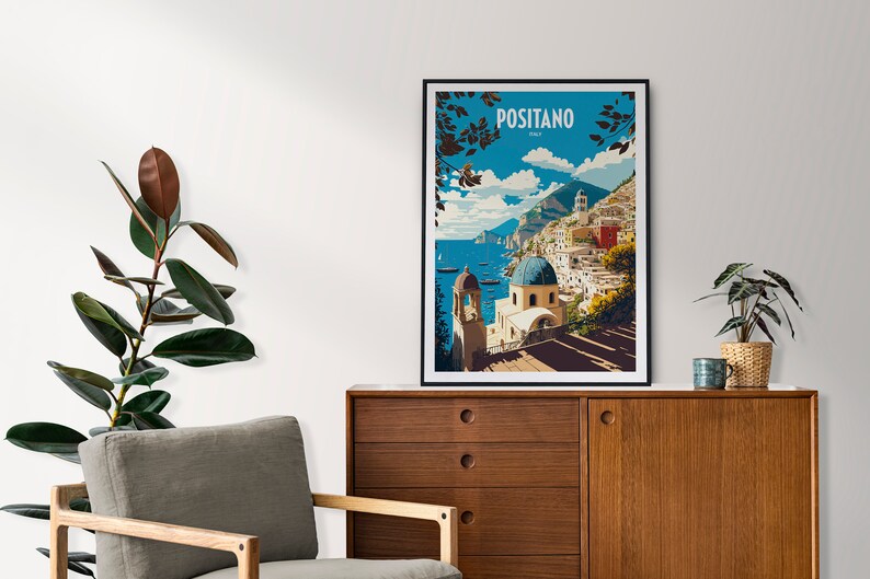 May include: A vintage travel poster featuring a colorful illustration of Positano, Italy. The poster depicts a picturesque coastal town with colorful buildings, a blue-domed church, and a view of the Mediterranean Sea.