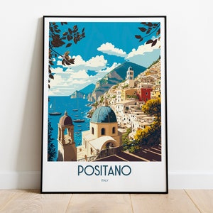 May include: A vintage travel poster featuring a colorful illustration of Positano, Italy. The poster depicts a picturesque coastal town with white buildings, a blue domed church, and a blue sea with boats. The text "Positano, Italy" is printed at the bottom of the poster.