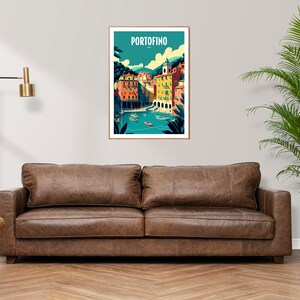 May include: A colorful illustration of the Italian town of Portofino, featuring buildings with terracotta roofs and a turquoise bay. The text "PORTOFINO" is printed in white at the top of the image.