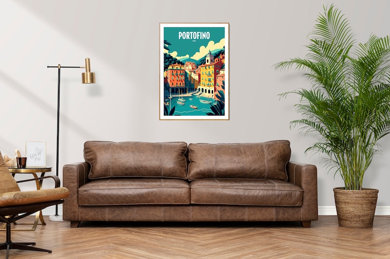 May include: A colorful illustration of the Italian town of Portofino, featuring buildings with terracotta roofs and a turquoise bay. The text "PORTOFINO" is printed in white at the top of the image.