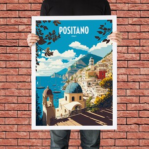 May include: A vintage travel poster featuring a colorful illustration of Positano, Italy. The poster has a blue background with white clouds and a view of the town's colorful buildings, a blue domed church, and the Mediterranean Sea.
