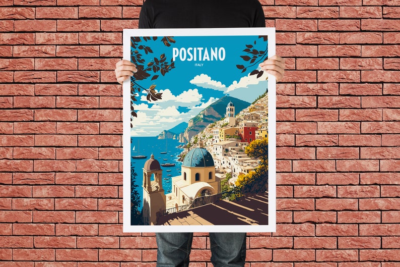 May include: A vintage travel poster featuring a colorful illustration of Positano, Italy. The poster has a blue background with white clouds and a view of the town's colorful buildings, a blue domed church, and the Mediterranean Sea.
