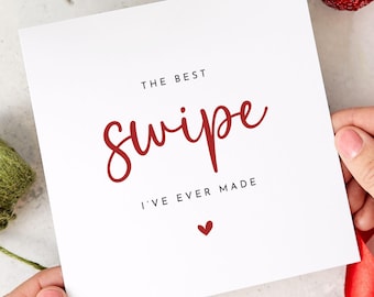 May include: White card with red text that reads "The Best Swipe I've Ever Made" with a small red heart at the bottom.