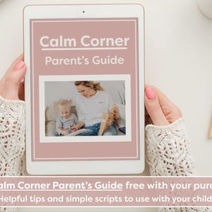 May include: A digital tablet displaying a pink and white document titled "Calm Corner Parent's Guide". The document features a photo of an adult woman and a young child sitting together. The text "Get Calm Corner Parent's Guide free with your purchase! Helpful tips and simple scripts to use with your child." is displayed below the tablet.
