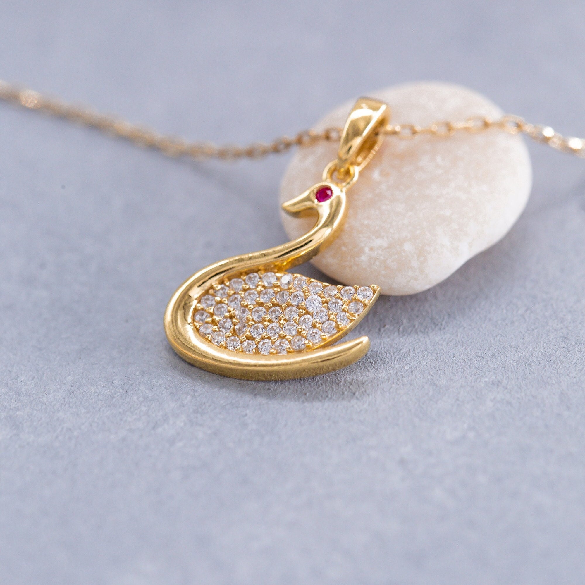 Swarovski Iconic Swan pendant, Swan, Medium, Red, Gold-tone plated |  Swarovski