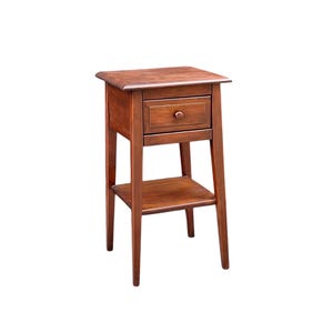May include: A tall, narrow wooden side table with a rich brown finish. The table features a single rectangular drawer with a small, centered round knob, a flat top surface, and an open lower shelf supported by four straight, slightly tapered legs.