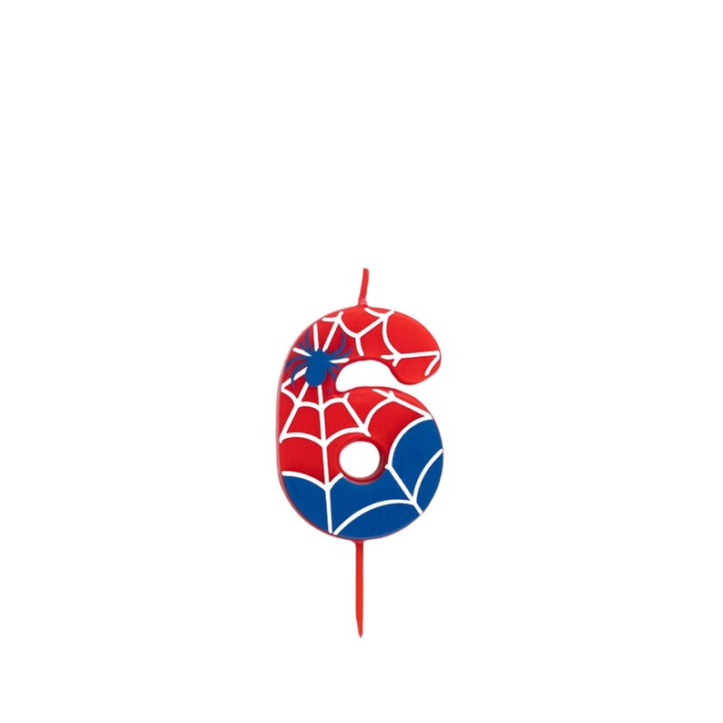 May include: A number 6 candle in red, white, and blue, featuring a spiderweb design. The candle has a blue spider emblem and a red wick. Ideal for a birthday cake.
