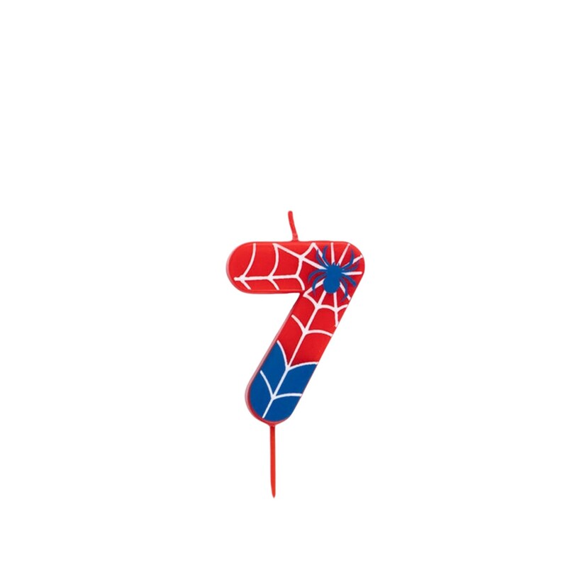 May include: A red, white, and blue number 7 birthday candle with a spiderweb design and a blue spider. The candle has a wick at the top and a stick at the bottom.