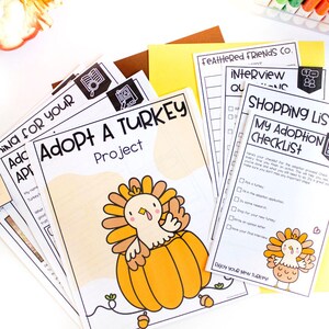 May include: A collection of printed papers with the title "Adopt a Turkey Project" and "Shopping List My Adoption Checklist". The cover features a cartoon turkey in a pumpkin. Other papers include interview questions and adoption checklists. The papers are on a white surface.