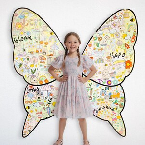 May include: A girl stands in front of a large butterfly-shaped wall decal. The decal is filled with colourful drawings of flowers, rainbows, butterflies, and other nature-themed imagery. The words "Bloom", "Grow", "Hope", and "Sunshine" are written on the decal.