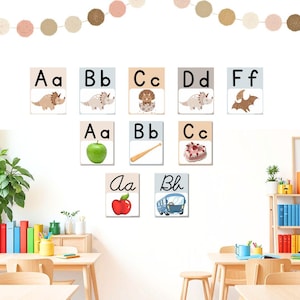 Pósteres del alfabeto con temática bohemia de dinosaurios. Fuentes cursivas y decorativas para primaria. Pósteres imprimibles de gran formato para el aula.