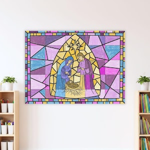 May include: A stained-glass style artwork depicting the Nativity scene. The image features Mary and Joseph looking at baby Jesus in a manger, with a star above. The artwork is framed with a colorful geometric border.