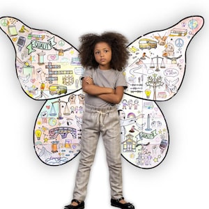 May include: A young person with curly brown hair stands in front of a large butterfly-shaped drawing. The drawing is filled with colorful illustrations and text, including the words "Equality" and "I Have a Dream".